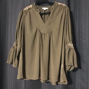 Sheer Forrest green top with beading.